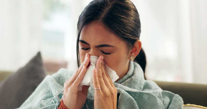 Woman dealing with allergies